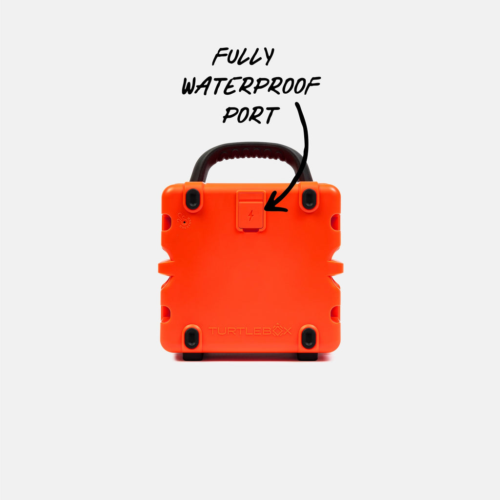 Orange portable device with a handle labeled 'Fully Waterproof Port' on a white background #base-color_orange