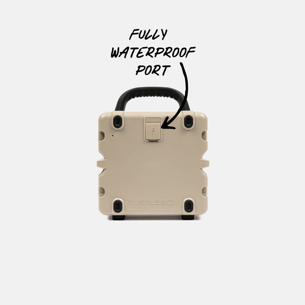 Tan speaker with a handle and 'FULLY WATERPROOF PORT' text on a white background #base-color_tan