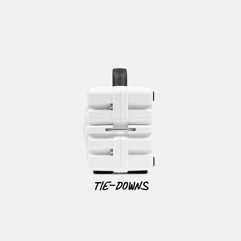 White tie-down system with black accents on a white background #base-color_white