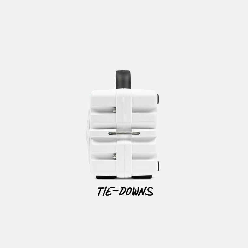 White tie-down system with black accents on a white background #base-color_white