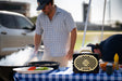 A lifestyle photo of a Black & Gold Original Gen 3 speaker. #speaker-color_black-gold-gameday-series