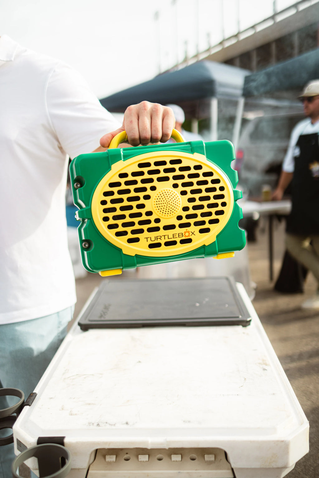 A lifestyle photo of a Green & Yellow Original Gen 3 speaker. #speaker-color_green-yellow-gameday-series