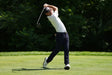 lifestyle photo of a man golfing, wearing a Live Free Patch Blue Hat