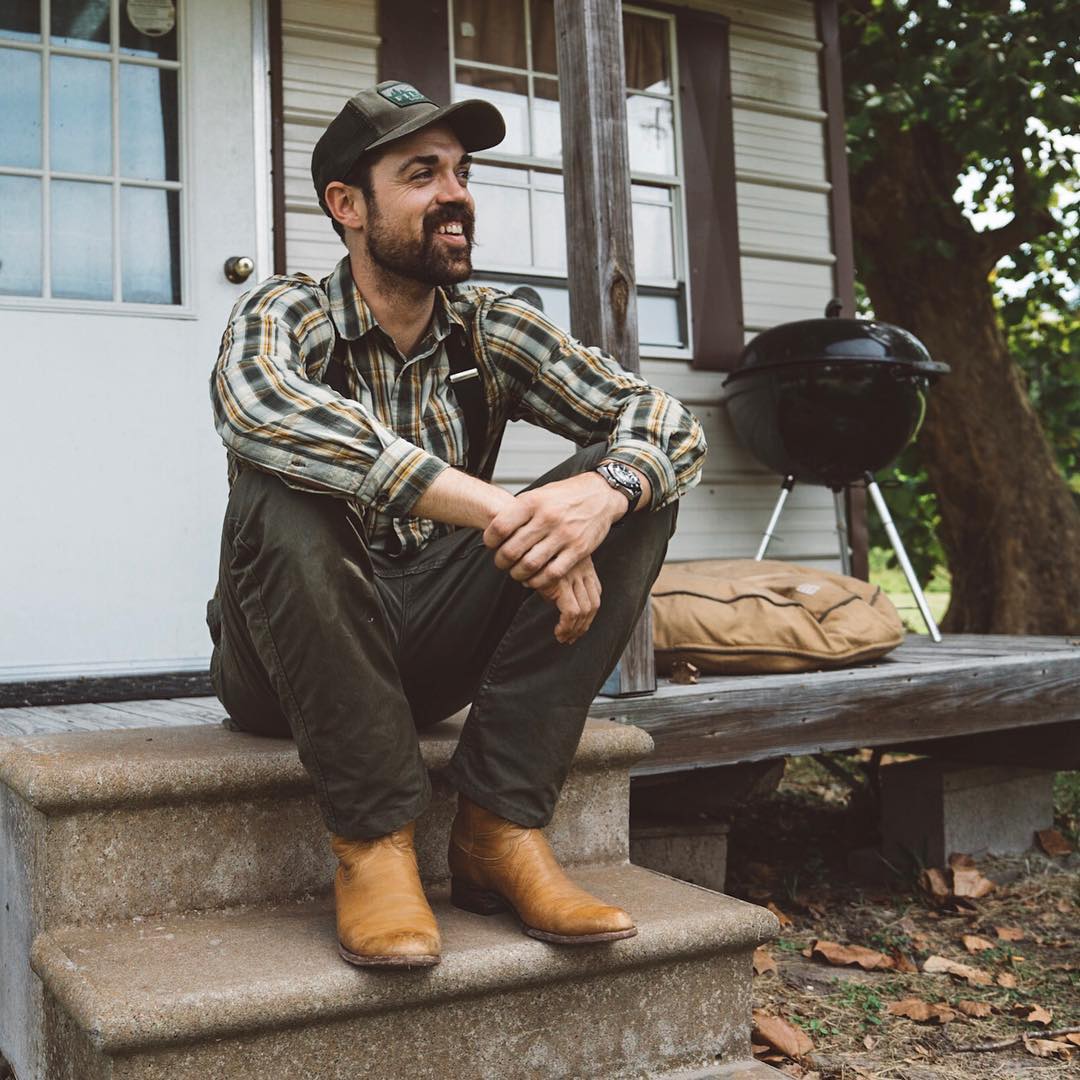 John Dunaway sitting on his porch 