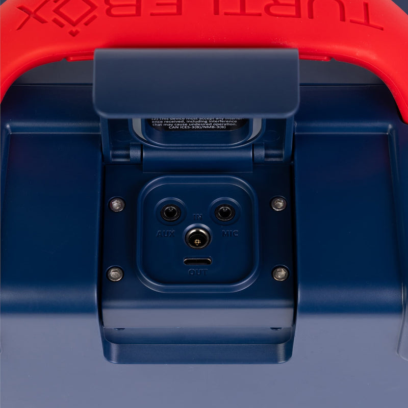 Close-up of a blue device with ports on a red and blue background #speaker-color_americana-blue