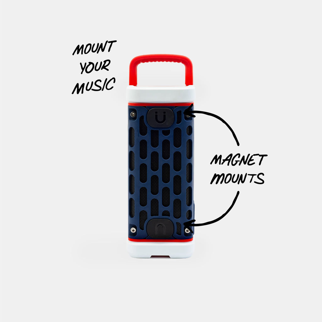 Portable speaker with magnet mounts on a white background #base-color_americana-blue