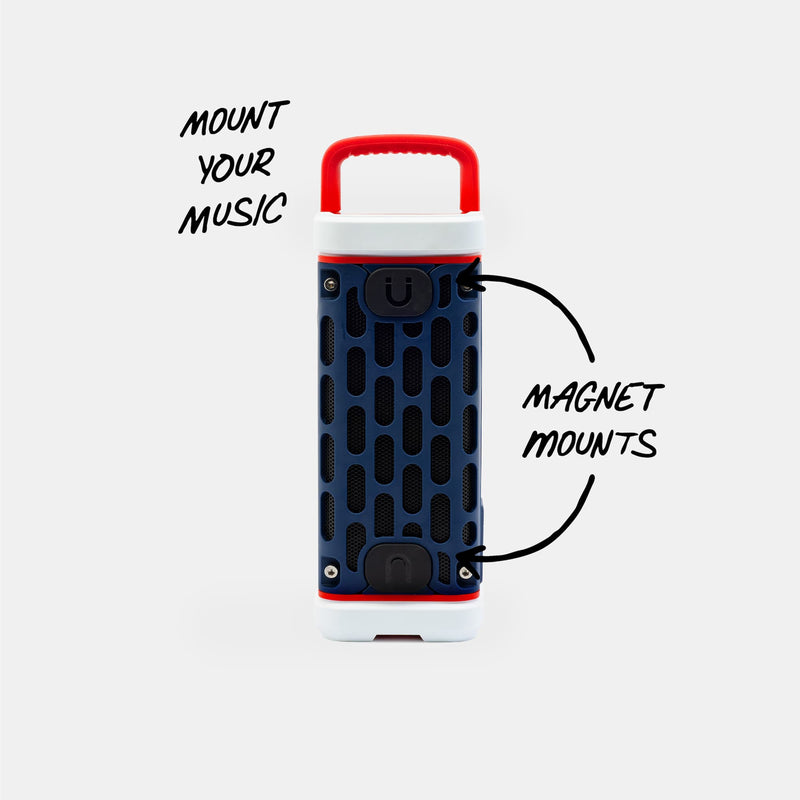 Portable speaker with magnet mounts on a white background #base-color_americana-blue