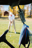 A lifestyle photo showing a Ranger speaker in gray attached to a golf car. #base-color_gray